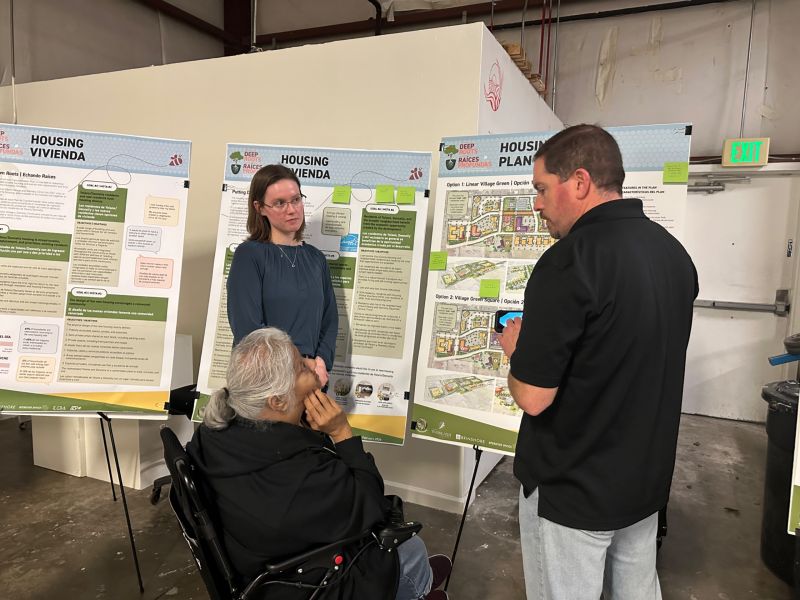 Resident talking to the project team